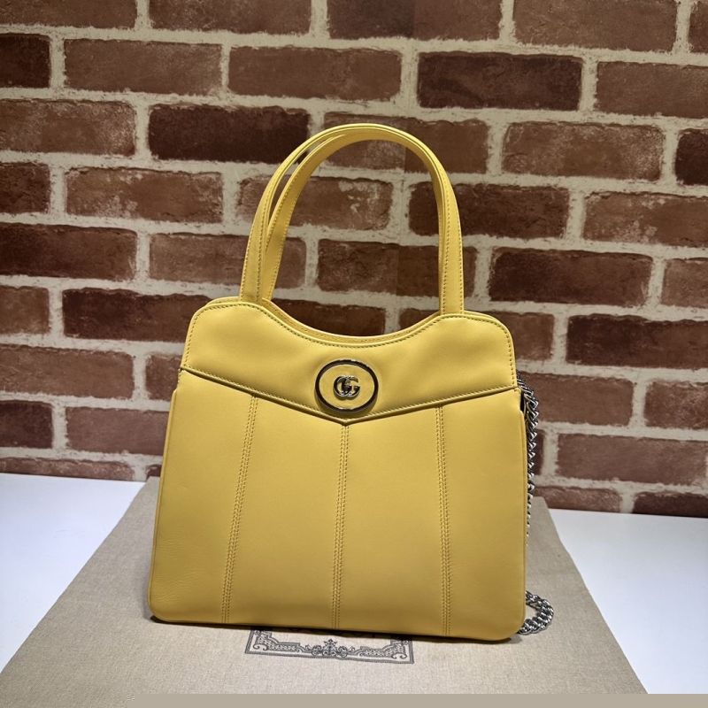 G*u*i top handle bags